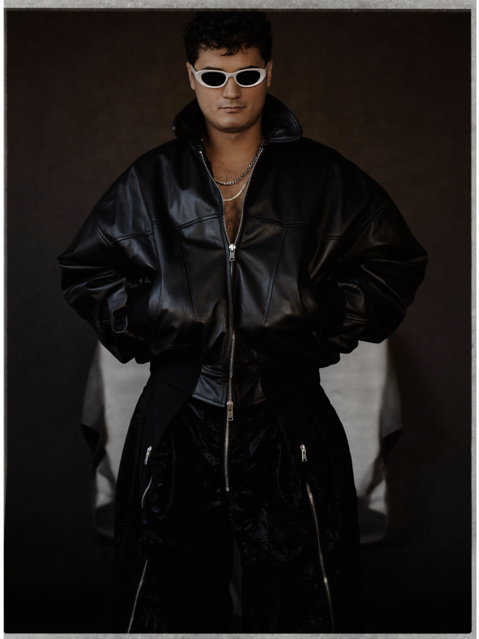 Dark editorial portrait of Alejandro Molinari
