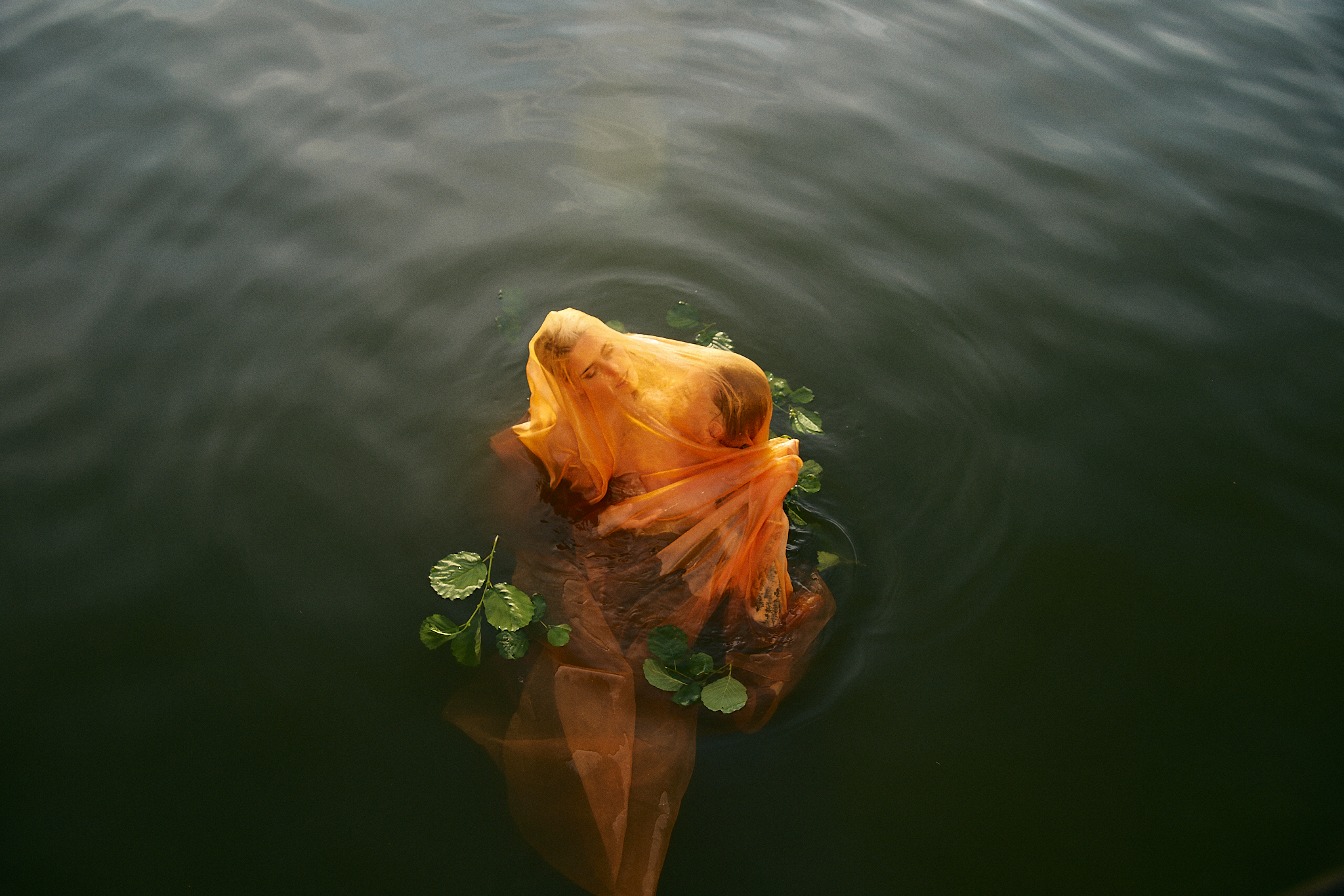Awake Dreaming suspended in a dream-state water scene