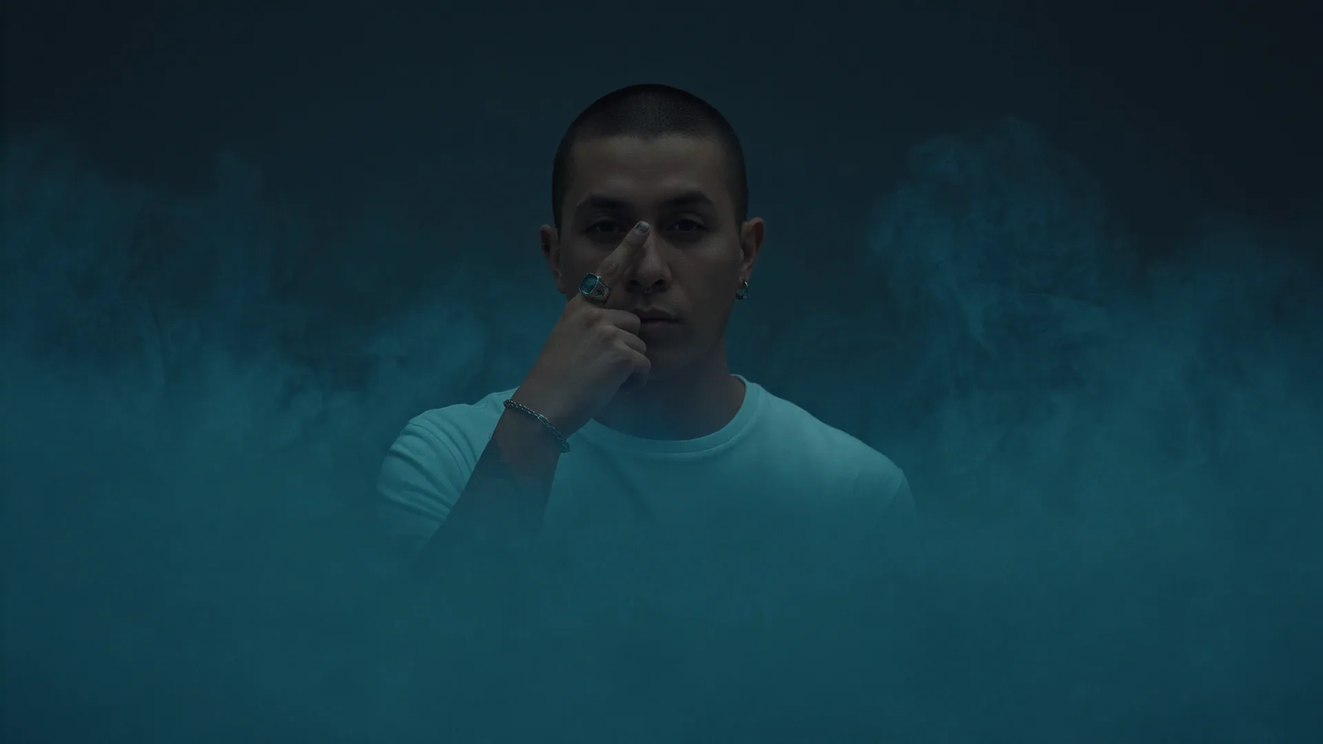 Badwolf portrait emerging through blue smoke